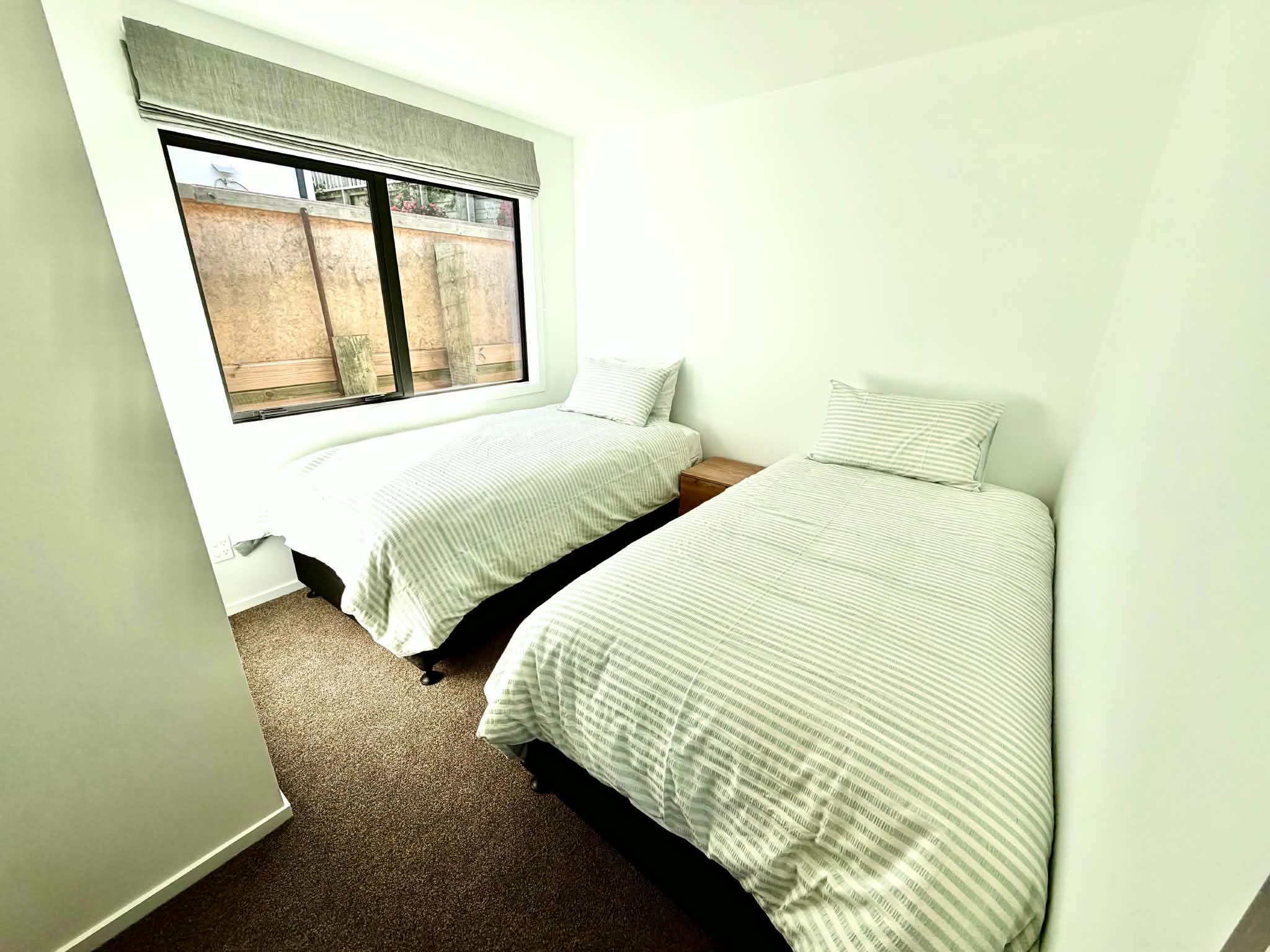 Third bedroom with two king single beds